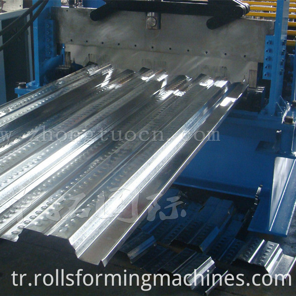 Floor deck roll forming machine (21) Floor deck roll forming machine (21)